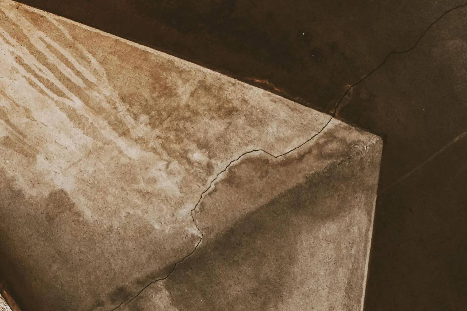 Water seepage staining on a ceiling in a Hong Kong flat